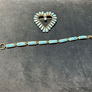 Natural stone and sterling silver brooch and bracelet.